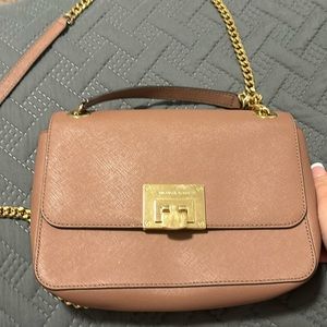 Beautiful dusty rose colored designer bag! Great for date night!